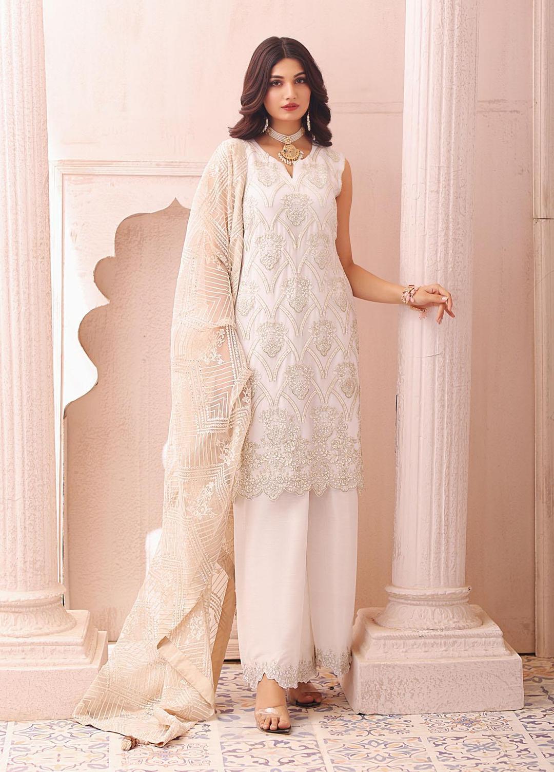 Buy Naushad Imdad NI-LC-003 IVORY BONE WHITE – Luxury Collection. choose good quality brands like Maria b zainab Chottani, Hussain Rehar etc... Various Pakistani branded dresses summer fabric, elegant design, perfect for casual & formal wear also shop eid collections from khaslibaas .delivery available in UK, USA, Canada, UAE, Dubai and other countries... 
