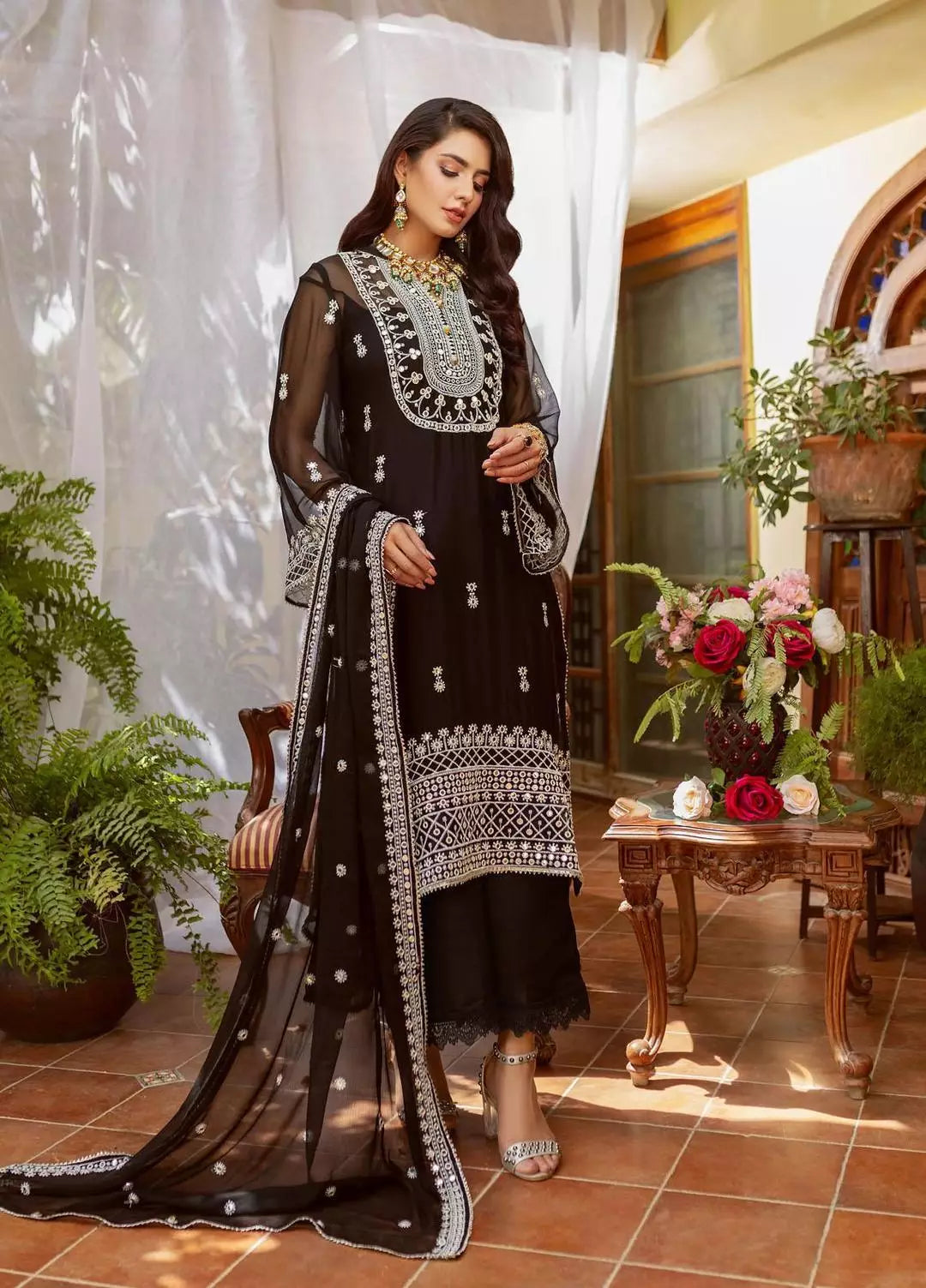 Buy Naushad Imdad Black Luxury chiffon. choose good quality brands like Maria b zainab Chottani, Hussain Rehar etc... Various Pakistani branded dresses summer fabric, elegant design, perfect for casual & formal wear also shop eid collections from khaslibaas .delivery available in UK, USA, Canada, UAE, Dubai and other countries...
